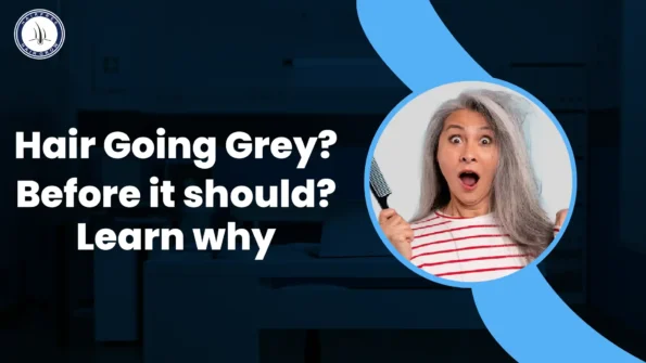Why Hair Grey Early? Surprised woman with grey hair holding a brush