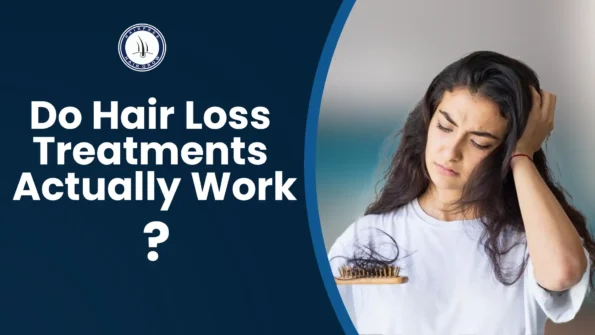 Worried woman holding a hairbrush, thinking do hair loss treatments actually work