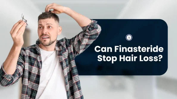 Finasteride Stop Hair Loss – Man worried about hair fall holding hair strands