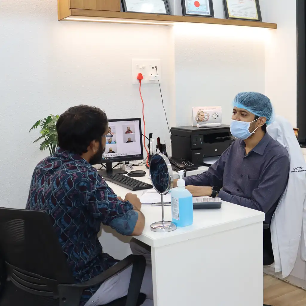 Doctor examining patient before hair transplant