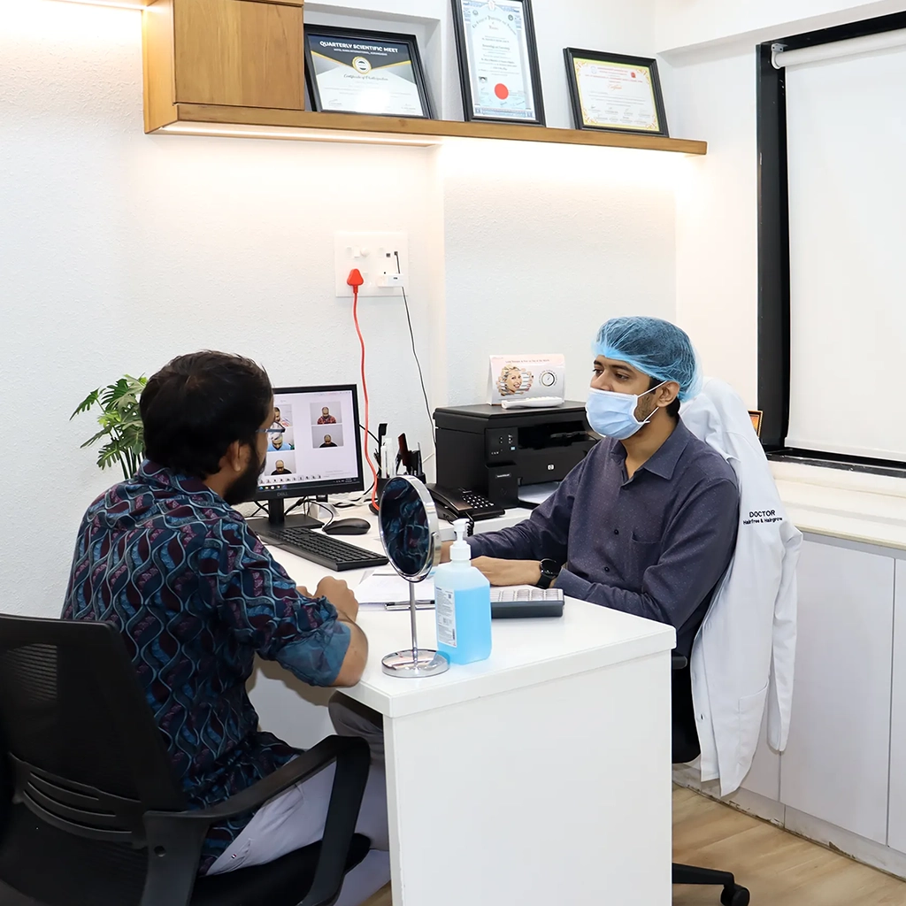Doctor examining patient before hair transplant
