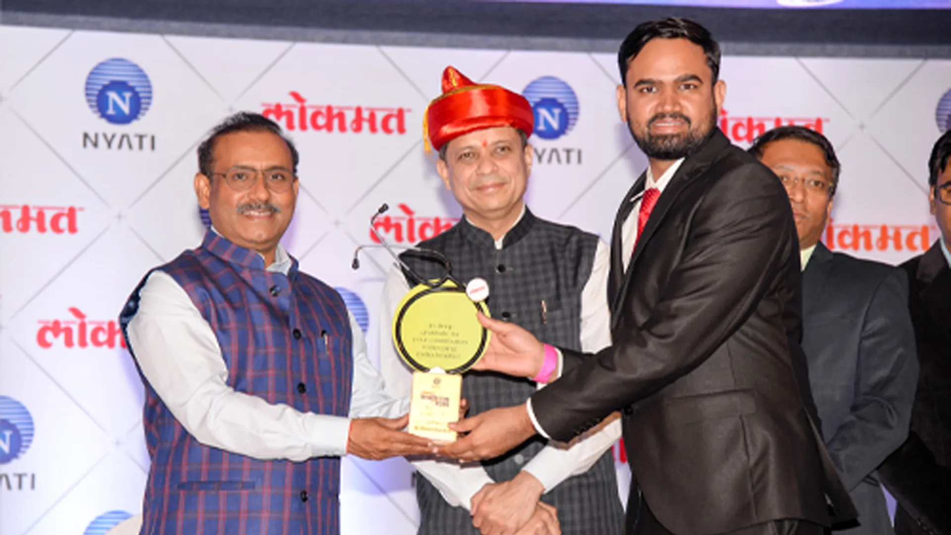 HairFree HairGrow team attending an award ceremony for excellence in hair transplant services in Pune