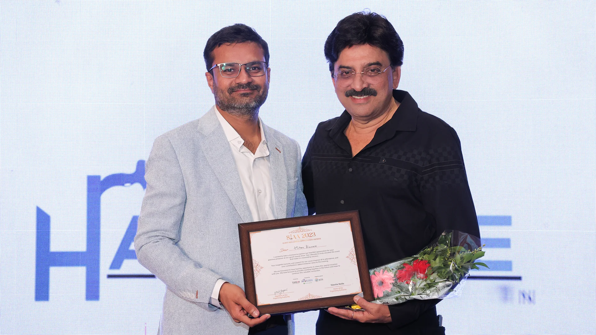 Hairfree Hairgrow representative receiving an industry recognition award