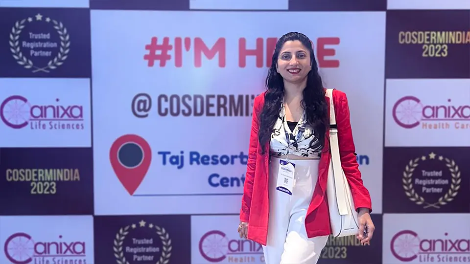 Dr. Richa Sanmukhani, hair transplant specialist in Ahmedabad, attending an advanced dermatology conference